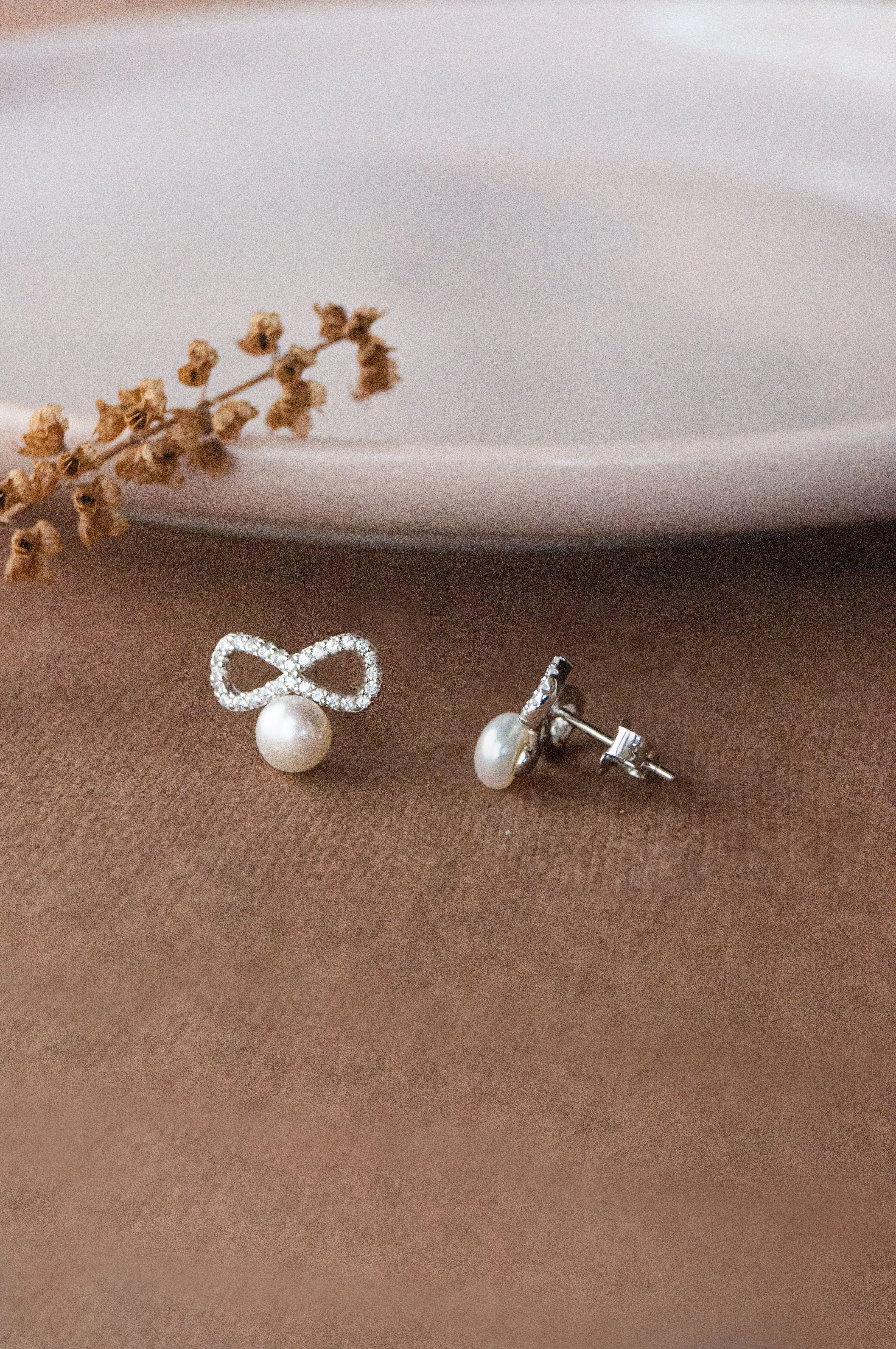 Infinity Bow With Pearl Sterling Silver Stud Earrings